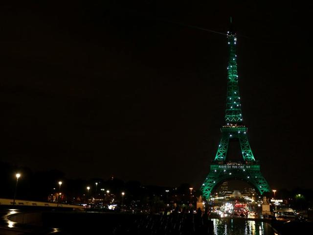 The Eiffel tower is illuminated in green, with the words " Paris Agreement is Done", to celebrate the Paris UN COP21 Climate Change agreement in Paris, France on November 4. (Reuters) The Eiffel tower is illuminated in green, with the words " Paris Agreement is Done", to celebrate the Paris UN COP21 Climate Change agreement in Paris, France on November 4. (Reuters)