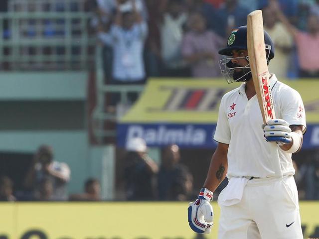 Virat Kohli finally broke his jinx against England as he slammed his 14th Test ton and shared a 226-run stand with Cheteshwar Pujara in Vizag.(BCCI)