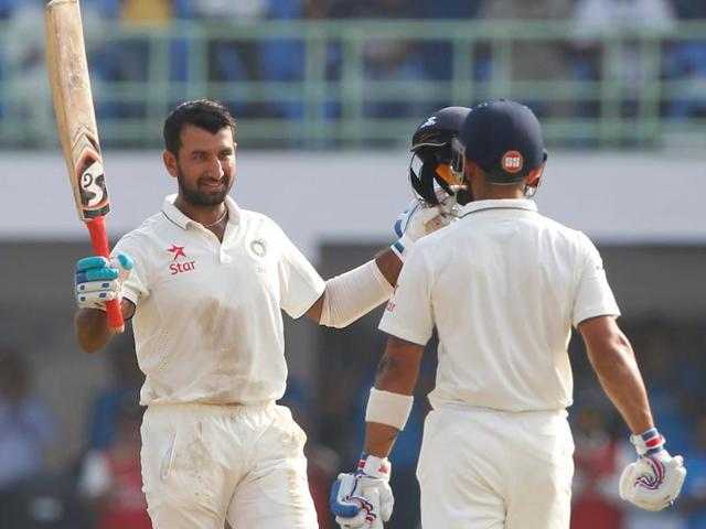 Cheteshwar Pujara of India celebrates his hundred during day one. (BCCI/ SPORTZPICS) 