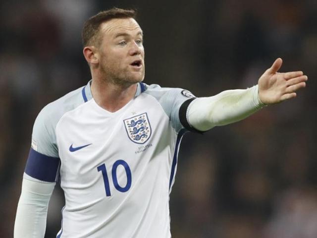 England's Wayne Rooney during his team’s match against Scotland. (REUTERS) England's Wayne Rooney during his team’s match against Scotland. (REUTERS)