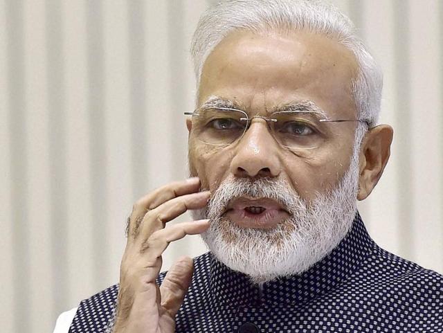 Prime Minister Narendra Modi gestures as he delivers a speech in New Delhi.(PTI Photo)