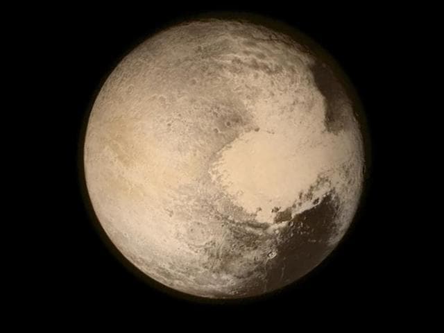 Pluto nearly fills the frame in this image from the Long Range Reconnaissance Imager (LORRI) aboard Nasa’s New Horizons spacecraft. (Reuters File Photo) Pluto nearly fills the frame in this image from the Long Range Reconnaissance Imager (LORRI) aboard Nasa’s New Horizons spacecraft. (Reuters File Photo)