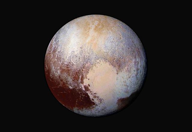 This image made available by Nasa shows a combination of images captured by the New Horizons spacecraft of Pluto's surface. (AP File Photo) This image made available by Nasa shows a combination of images captured by the New Horizons spacecraft of Pluto's surface. (AP File Photo)