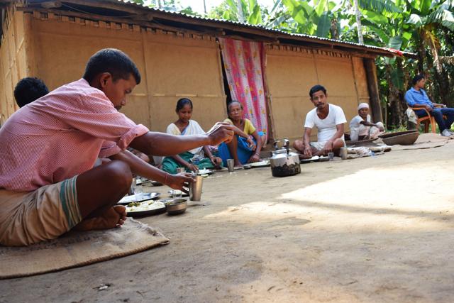 Babul Rabha sharing a meal with his family. Babul has been using the barter system to battle the cash crunch. Babul Rabha sharing a meal with his family. Babul has been using the barter system to battle the cash crunch.