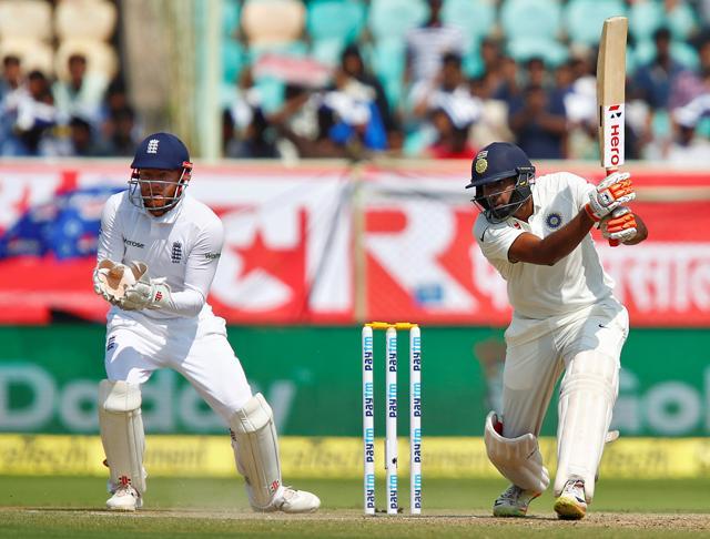 R Ashwin notched up his eighth fifty in Tests as India neared 450 on the second day of the Vizag Test. (REUTERS) R Ashwin notched up his eighth fifty in Tests as India neared 450 on the second day of the Vizag Test. (REUTERS)