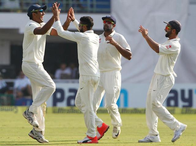 Jayant Yadav of India and Ravindra Jadeja of India celebrates the wicket of Haseeb Hameed of England. (BCCI/ SPORTZPICS) 