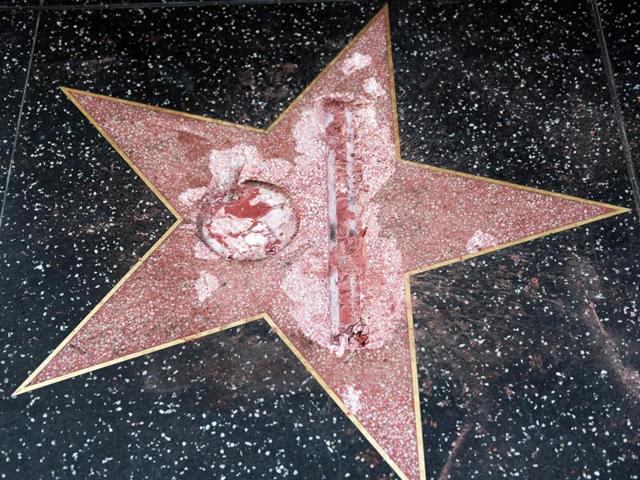 This October 26, 2016 photo shows a crowd around Donald Trump's vandalised star along the Hollywood Walk of Fame in Hollywood, California, being repaired before being replaced. (AFP file photo) This October 26, 2016 photo shows a crowd around Donald Trump's vandalised star along the Hollywood Walk of Fame in Hollywood, California, being repaired before being replaced. (AFP file photo)