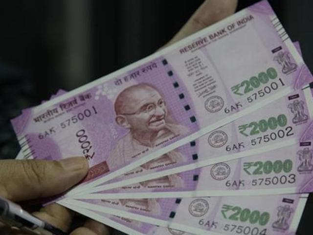 In the midst of all the chaos that demonetisation has caused, here are five things for which you may have to shell out more.(AP Photo) In the midst of all the chaos that demonetisation has caused, here are five things for which you may have to shell out more.(AP Photo)