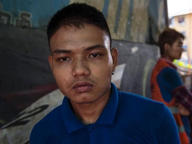 Former Myanmar child soldier, 21-year-old Su Thet Htoo, cleans a car at a car wash and repair shop in Yangon. The army and seven ethnic armed groups have been listed by the UN as using underage fighters -- those below the age of 18 -- as they clash in the country's borderlands. (AFP) Former Myanmar child soldier, 21-year-old Su Thet Htoo, cleans a car at a car wash and repair shop in Yangon. The army and seven ethnic armed groups have been listed by the UN as using underage fighters -- those below the age of 18 -- as they clash in the country's borderlands. (AFP)