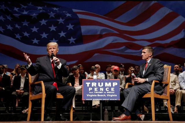 Republican presidential nominee Donald Trump (left) speaks along side Michael Flynn during a campaign town hall meeting in Virginia Beach, Virginia. (Reuters File Photo) Republican presidential nominee Donald Trump (left) speaks along side Michael Flynn during a campaign town hall meeting in Virginia Beach, Virginia. (Reuters File Photo)