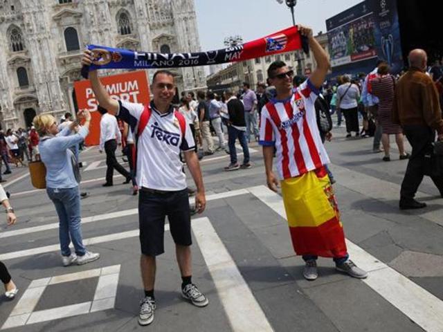 Atletico's Stefan Savic, center right, and Real Madrid's Karim Benzema jump for the ball. (AP) Atletico's Stefan Savic, center right, and Real Madrid's Karim Benzema jump for the ball. (AP)