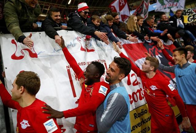 RB Leipzig's Emil Forsberg celebrates after he scored the team’s second goal against Bayer Leverkusen. (Reuters) RB Leipzig's Emil Forsberg celebrates after he scored the team’s second goal against Bayer Leverkusen. (Reuters)