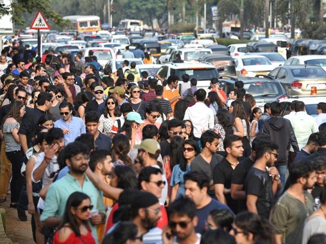 People wait in queues to enter the Global Citizen India concert at MMRDA Grounds, BKC, in Mumbai, on Saturday. (Pratik Chorge/HT PHOTO) 