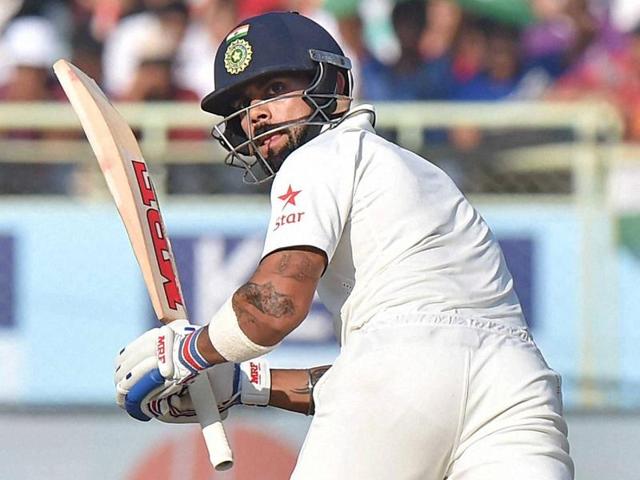 Indian captain Virat Kohli further loosened England cricket team’s grip on the Vizag Test by accelerating, attacking Ben Stokes and Adil Rashid on Saturday.(PTI)