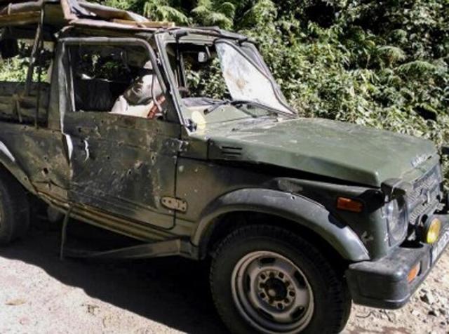 Bullet marks are seen on a damaged army vehicle at Pengeri in Assam's Tinsukia district on November 19, 2016, following an ambush attack by armed militants.(AFP Photo)