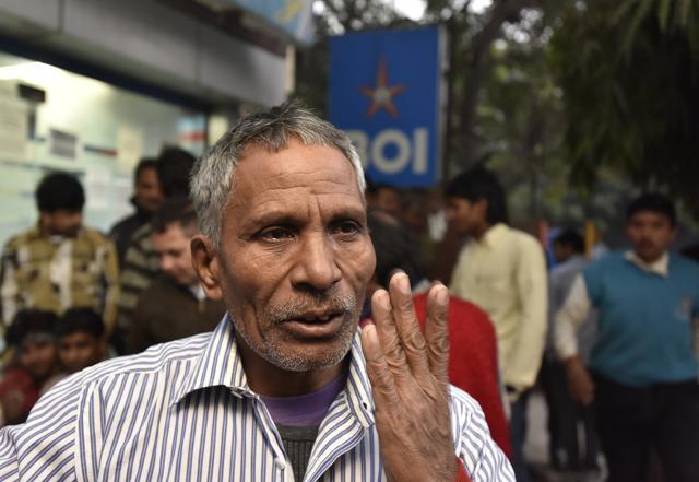 Vachan Singh outside the Bank at East of Kailash in New Delhi on Friday (Sanjeev Verma/HT Photo) Vachan Singh outside the Bank at East of Kailash in New Delhi on Friday (Sanjeev Verma/HT Photo)