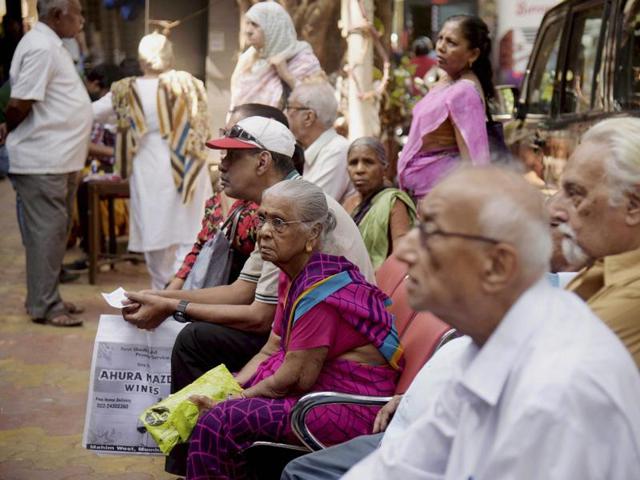 Senior citizens queue up outside a bank to exchange their old Rs 500 and 1000 notes outside in Mumbai. (PTI Photo) Senior citizens queue up outside a bank to exchange their old Rs 500 and 1000 notes outside in Mumbai. (PTI Photo)