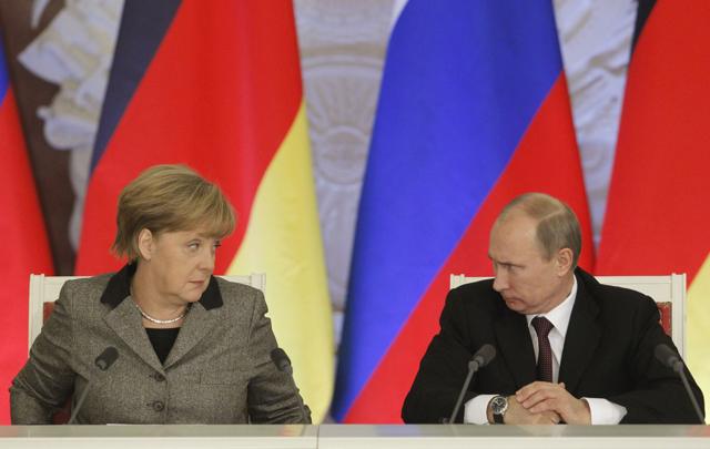 Russian President Vladimir Putin (right) with German Chancellor Angela Merkel during a joint news conference in Moscow’s Kremlin in 2012. (Reuters file) Russian President Vladimir Putin (right) with German Chancellor Angela Merkel during a joint news conference in Moscow’s Kremlin in 2012. (Reuters file)