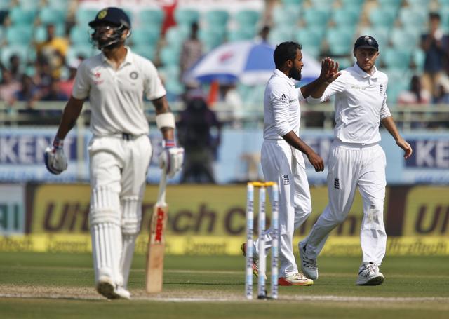 Adil Rashid took the wicket of Virat Kohli for 81 thanks to a marvellous catch from Ben Stokes as India lost wickets at regular intervals. (AP) Adil Rashid took the wicket of Virat Kohli for 81 thanks to a marvellous catch from Ben Stokes as India lost wickets at regular intervals. (AP)
