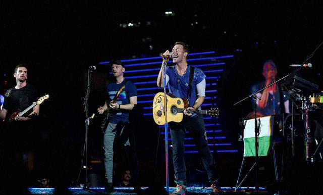 Chris Martin of British Band Coldplay performs during the Global Citizen concert in Mumbai on Saturday. (PTI)