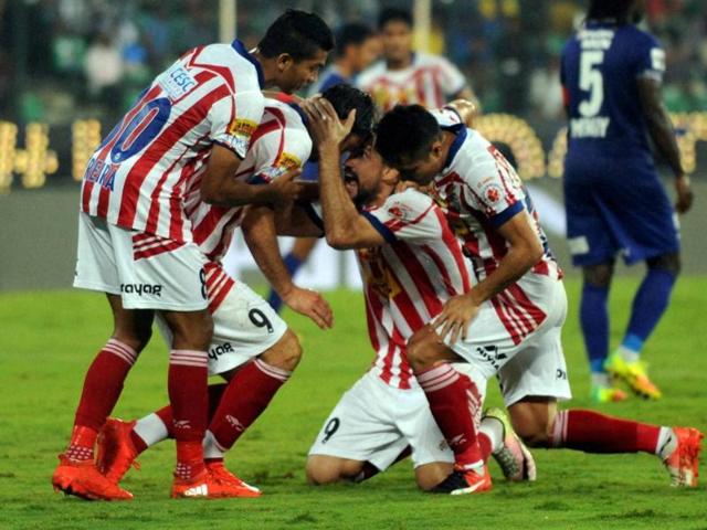 Atletico De Kolkata's Helder Manuel Postiga celebrates with teammates after scoring against Chennaiyin FC during the Indian Super League (ISL) football match at Jawaharlal Nehru Stadium in Chennai on Sunday. (PTI) Atletico De Kolkata's Helder Manuel Postiga celebrates with teammates after scoring against Chennaiyin FC during the Indian Super League (ISL) football match at Jawaharlal Nehru Stadium in Chennai on Sunday. (PTI)
