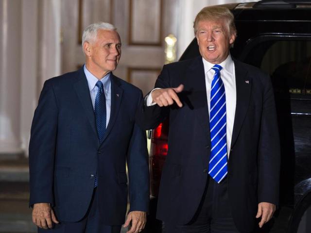 US President-elect Donald Trump and US Vice President-elect Mike Pence depart after a day of meetings at the clubhouse of Trump National Golf Club on Saturday in Bedminster. (AFP Photo) US President-elect Donald Trump and US Vice President-elect Mike Pence depart after a day of meetings at the clubhouse of Trump National Golf Club on Saturday in Bedminster. (AFP Photo)