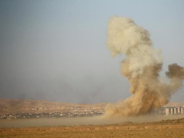 Smoke rises from clashes during a battle with Islamic State militants at the airport of Tal Afar west of Mosul, Iraq.(Reuters Photo) Smoke rises from clashes during a battle with Islamic State militants at the airport of Tal Afar west of Mosul, Iraq.(Reuters Photo)