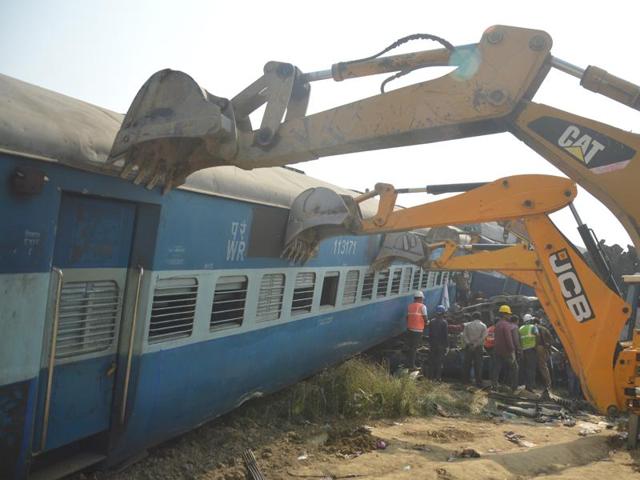 Kanpur, India - November 20: Rescue workers search for survivors at the site of a train derailment in Kanpur Dehat district. (HT Photo)