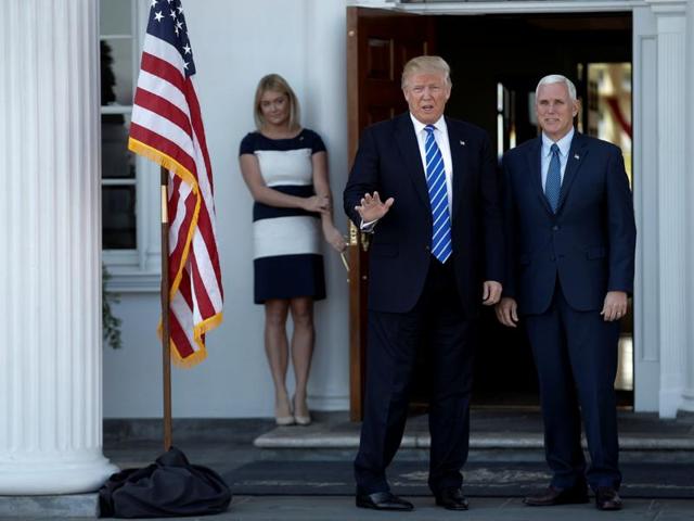 US President-elect Donald Trump and Vice President-elect Mike Pence (R) stand together as they arrive at the the main clubhouse at Trump National Golf Club in Bedminster, New Jersey, US. (Reuters Photo) US President-elect Donald Trump and Vice President-elect Mike Pence (R) stand together as they arrive at the the main clubhouse at Trump National Golf Club in Bedminster, New Jersey, US. (Reuters Photo)