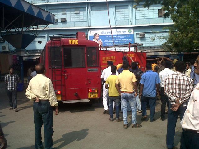 Heavy smoke was seen at the Ronald Ross building of the hospital around 11.15 am. Fire was located at the 6th floor of the building. Following which panic gripped patients and their relatives who started to run around the hospital premises.(HT Photo/Ashok Nath Dey)