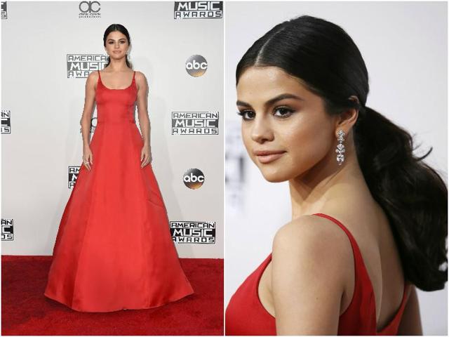 Singer and actor Selena Gomez wore a red Prada number with gorgeous diamond earrings. She completed the look with her thick hair tied into a ponytail. Singer and actor Selena Gomez wore a red Prada number with gorgeous diamond earrings. She completed the look with her thick hair tied into a ponytail.