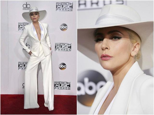 Singer Lady Gaga wore a gorgeously stitched white suit from Brandon Maxwell. Singer Lady Gaga wore a gorgeously stitched white suit from Brandon Maxwell.