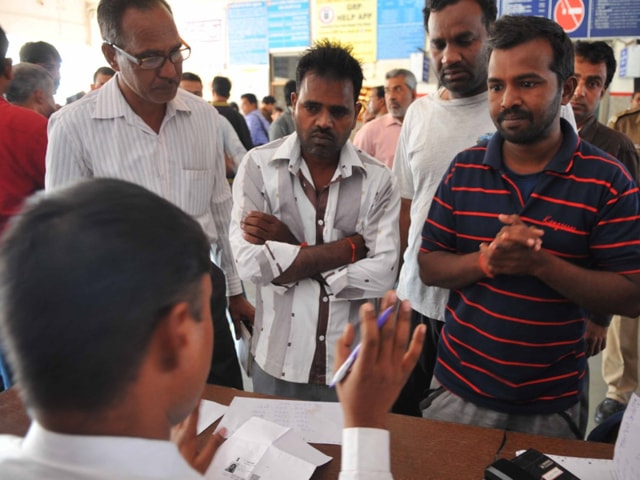 The relative of a passenger shows his photo at an inquiry counter in Indore. (Shankar Mourya/HT) The relative of a passenger shows his photo at an inquiry counter in Indore. (Shankar Mourya/HT)