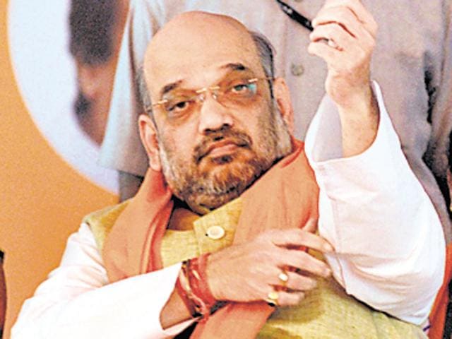 BJP president Amit Shah flanked by city unit chief Sanjay Tandon (left) and Lok Sabha member Kirron Kher during his meeting with booth-level party workers at Ramlila Ground in Sector 27, Chandigarh, on Sunday. (Ravi Kumar/HT Photo) BJP president Amit Shah flanked by city unit chief Sanjay Tandon (left) and Lok Sabha member Kirron Kher during his meeting with booth-level party workers at Ramlila Ground in Sector 27, Chandigarh, on Sunday. (Ravi Kumar/HT Photo)