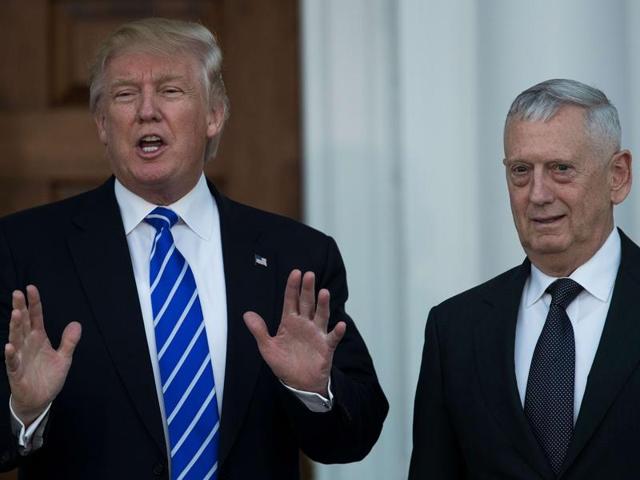 President-elect Donald Trump speaks to reporters as he stands alongside retired United States Marine Corps general James Mattis after their meeting at Trump International Golf Club in Bedminster Township, New Jersey. (AFP Photo) President-elect Donald Trump speaks to reporters as he stands alongside retired United States Marine Corps general James Mattis after their meeting at Trump International Golf Club in Bedminster Township, New Jersey. (AFP Photo)