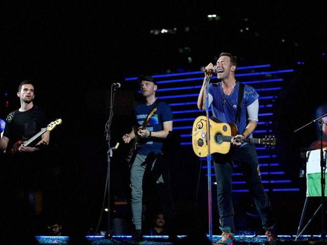 Chris Martin of British band Coldplay performs during the Global Citizen concert in Mumbai on Saturday. (PTI) Chris Martin of British band Coldplay performs during the Global Citizen concert in Mumbai on Saturday. (PTI)