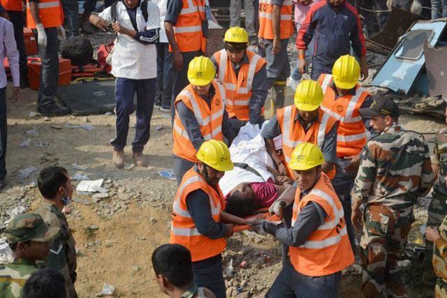 NDRF men carry out rescue and relief works after the Indore-Patna Express derailed near Kanpur Dehat. (PTI Photo) NDRF men carry out rescue and relief works after the Indore-Patna Express derailed near Kanpur Dehat. (PTI Photo)