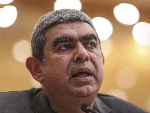 Infosys CEO Vishal Sikka speaks during a news conference at the company's headquarters in Bengaluru.(Getty Images)