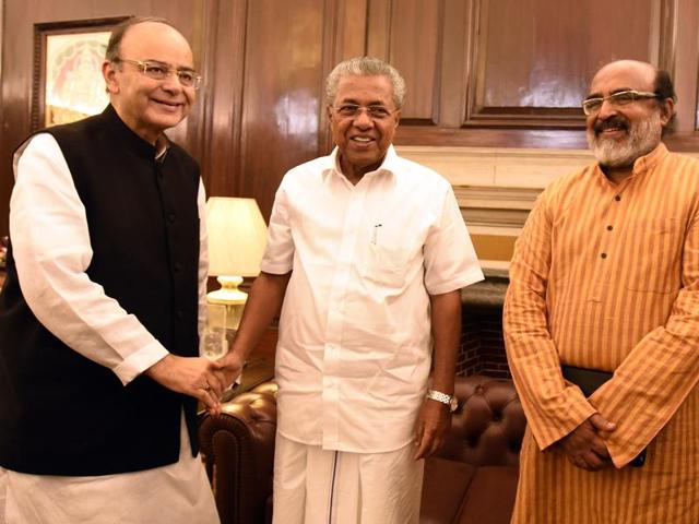 Union finance minister Arun Jaitley shaking hands with Kerala finance minister Thomas Isaac in the presence of Kerala chief Minister Pinarayi Vijayan. (HT File Photo) Union finance minister Arun Jaitley shaking hands with Kerala finance minister Thomas Isaac in the presence of Kerala chief Minister Pinarayi Vijayan. (HT File Photo)