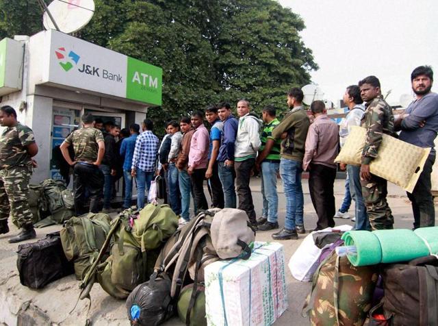 Gurugram : People stand in a long queue outside an ATM to withdraw money in Gurugram on Sunday. (PTI Photo) Gurugram : People stand in a long queue outside an ATM to withdraw money in Gurugram on Sunday. (PTI Photo)