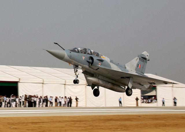 Mirage 2000 touches down during the opening of Agra-Lucknow expressway. (PTI) Mirage 2000 touches down during the opening of Agra-Lucknow expressway. (PTI)