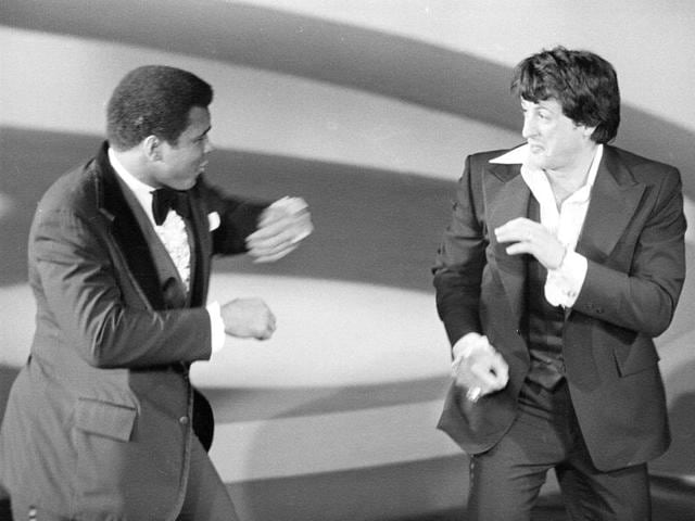 Muhammad Ali makes a surprise appearance on the Academy Awards show, playfully sparring with actor and screenwriter Sylvester Stallone in Los Angeles in March, 1977. (AP Photo) Muhammad Ali makes a surprise appearance on the Academy Awards show, playfully sparring with actor and screenwriter Sylvester Stallone in Los Angeles in March, 1977. (AP Photo)