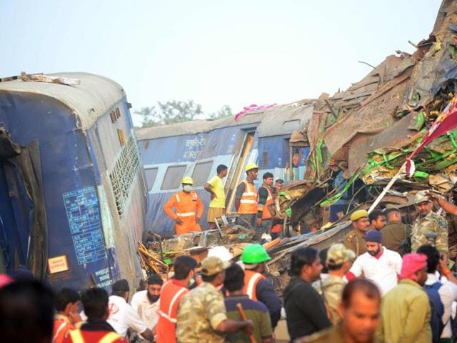 Rescue workers search for survivors in the wreckage of Indore-Patna Express that derailed near Kanpur Dehat district. (AFP Photo) Rescue workers search for survivors in the wreckage of Indore-Patna Express that derailed near Kanpur Dehat district. (AFP Photo)