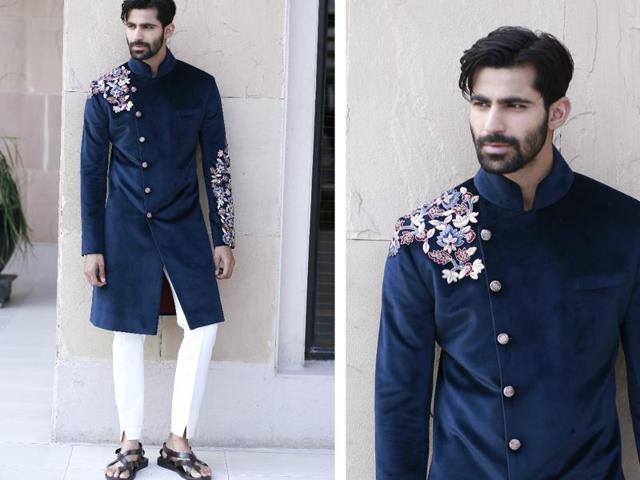 Model Mayank Bajpai wearing a velvet Bandhgala teamed with a pair of white pants from the designer’s collection. (photos: Waseem Gashroo/HT) Model Mayank Bajpai wearing a velvet Bandhgala teamed with a pair of white pants from the designer’s collection. (photos: Waseem Gashroo/HT)