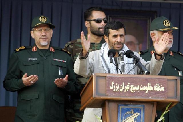Former Iranian President Mahmoud Ahmadinejad at the mausoleum of Ayatollah Khomeini with Revolutionary Guards. IRGC gained more power and economic activities under Ahmadijejad. (Agencies File Photo) Former Iranian President Mahmoud Ahmadinejad at the mausoleum of Ayatollah Khomeini with Revolutionary Guards. IRGC gained more power and economic activities under Ahmadijejad. (Agencies File Photo)