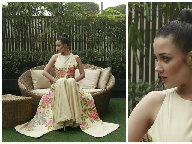 Model Anastasiya Hamolka in long tunic with oversized flowers teamed with palazzo pants conjure fairytale romance with a sprinkle of fun. (photos: Waseem Gashroo/HT) Model Anastasiya Hamolka in long tunic with oversized flowers teamed with palazzo pants conjure fairytale romance with a sprinkle of fun. (photos: Waseem Gashroo/HT)