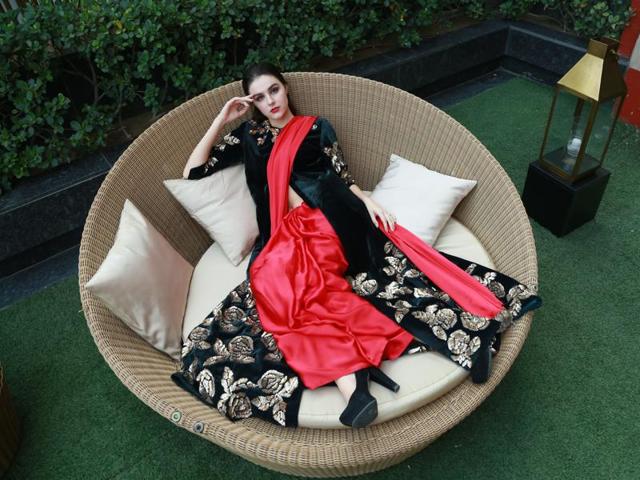 Model Julia wearing a slinky sari with a long embellished jacket from Manish Malhotra’s The  Persian  Story.  (photos: Waseem Gashroo/HT) 