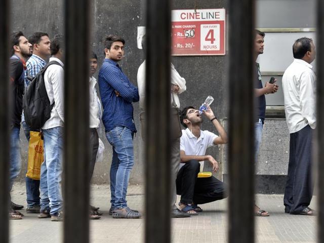 Fall in line: An order many heard years later outside an ATM machine at Sion in Mumbai. (Kunal Patil/HT Photo) Fall in line: An order many heard years later outside an ATM machine at Sion in Mumbai. (Kunal Patil/HT Photo)