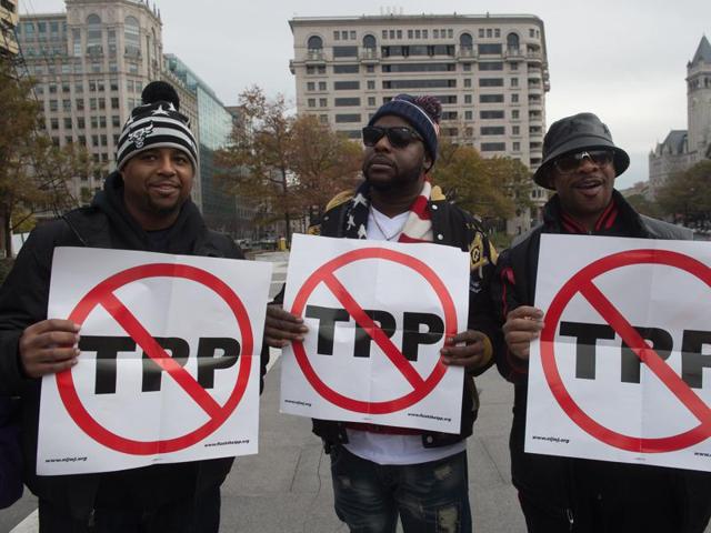 A demonstration against the Trans-Pacific Partnership trade agreement in Washington, DC.(AFP)