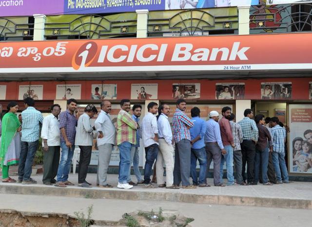 People stand in long queue at Punjab National Bank to change or deposit the Demonetization of 500 and 1000 banknotes was a step taken by the Government of India on November 21, 2016. (Mohd Zakir/HT PHOTO) People stand in long queue at Punjab National Bank to change or deposit the Demonetization of 500 and 1000 banknotes was a step taken by the Government of India on November 21, 2016. (Mohd Zakir/HT PHOTO)